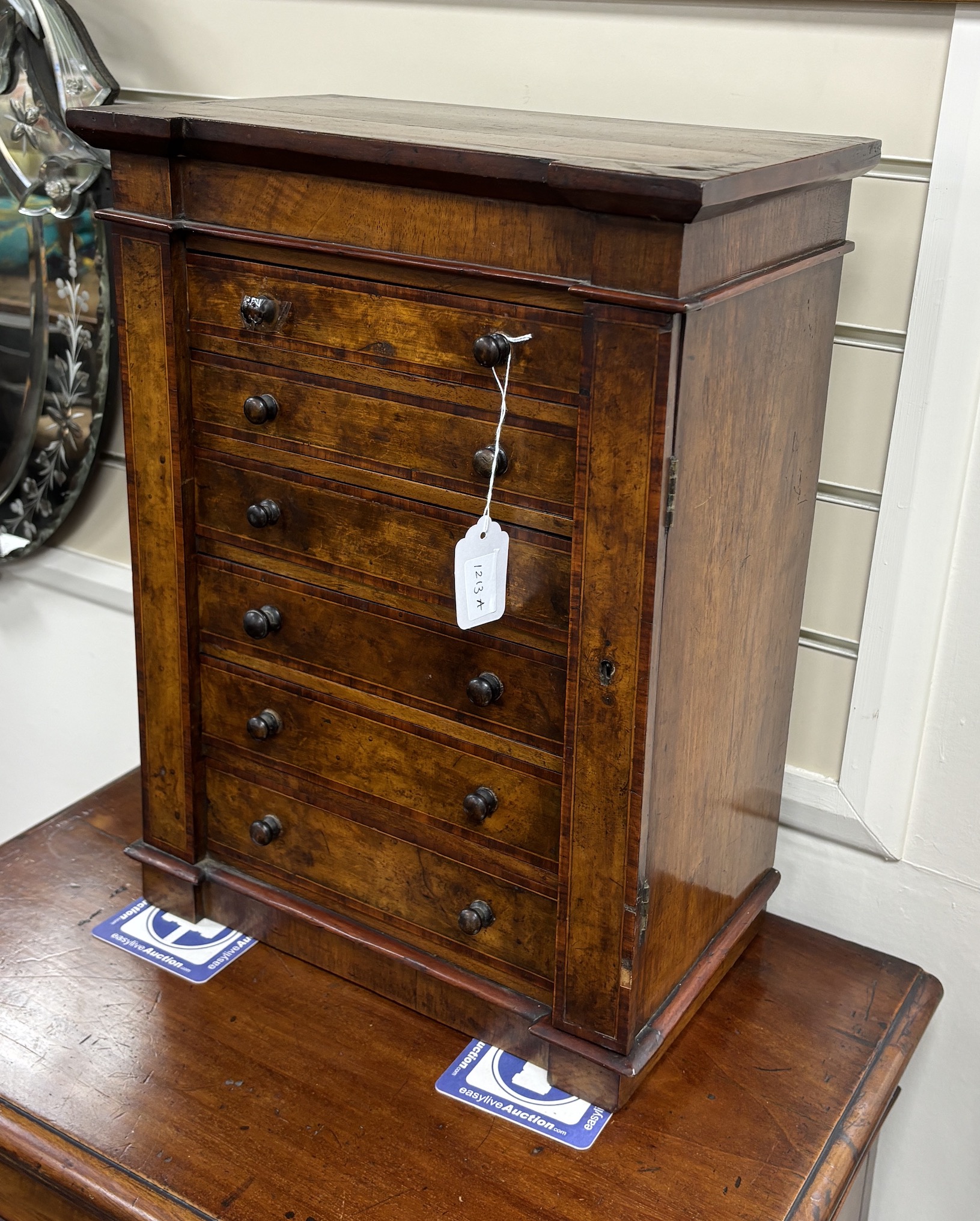 A Victorian banded walnut miniature Wellington chest, width 37cm, depth 22cm, height 50cm